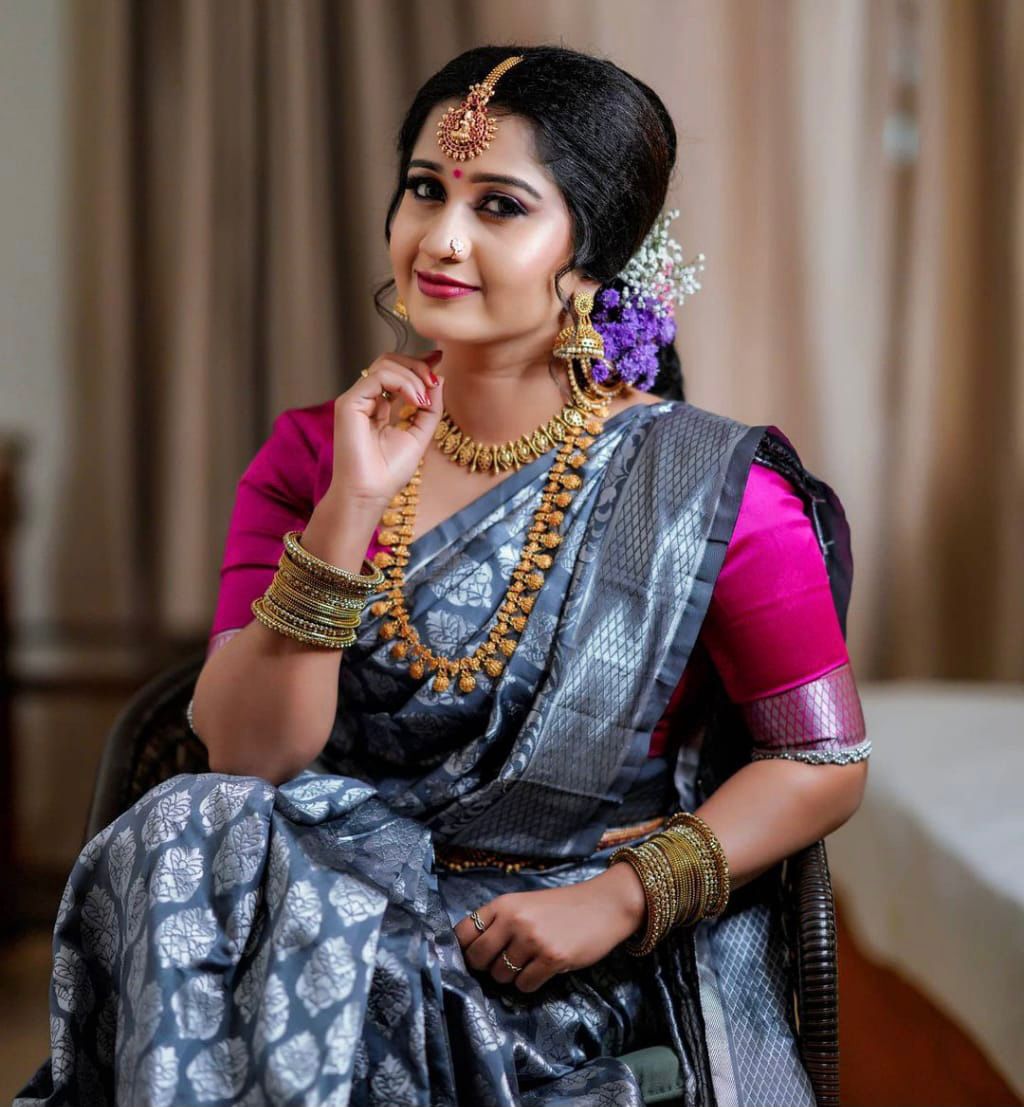 Beautifully Crafted Lichi Silk Saree with Zari Border