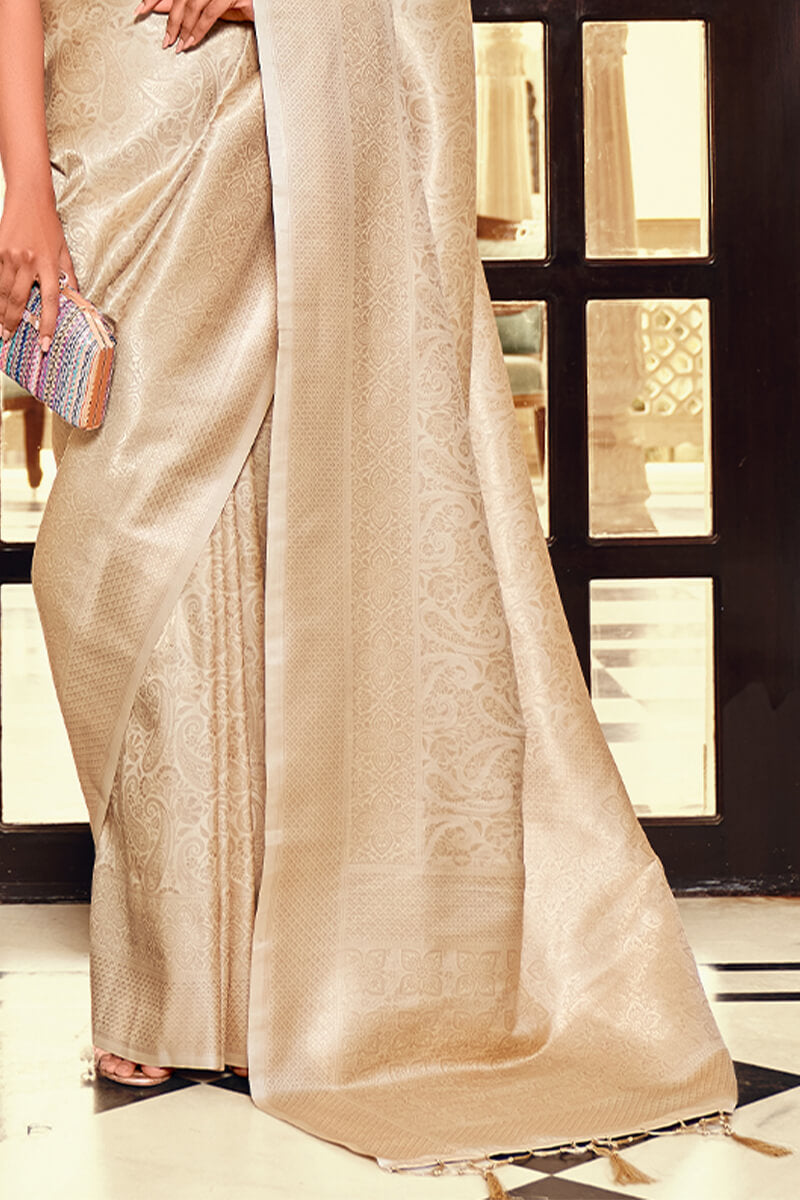 Exquisite Beige Kanjivaram Silk Saree With Comely Blouse Piece