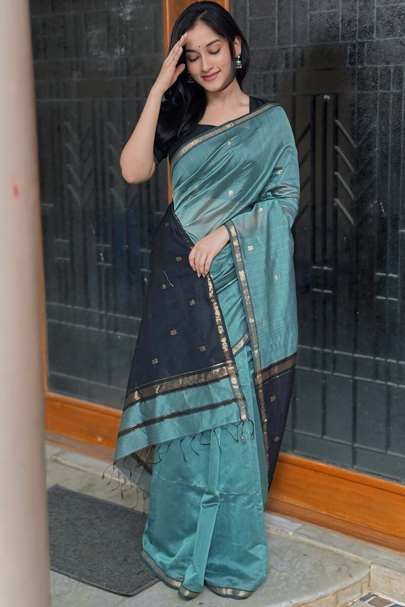 Classy Sea Green Cotton Silk Saree With Gratifying Blouse Piece