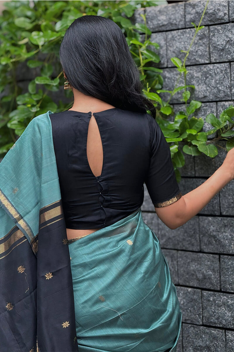 Classy Sea Green Cotton Silk Saree With Gratifying Blouse Piece