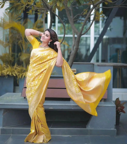 Stunning Yellow Soft Silk Saree With Resonant Blouse Piece