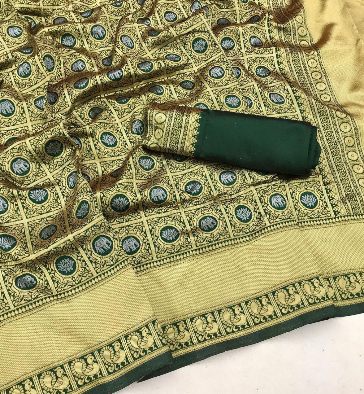 Luxurious Rama and Golden Soft Silk Saree With Angelic Blouse Piece