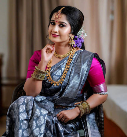 Beautifully Crafted Lichi Silk Saree with Zari Border