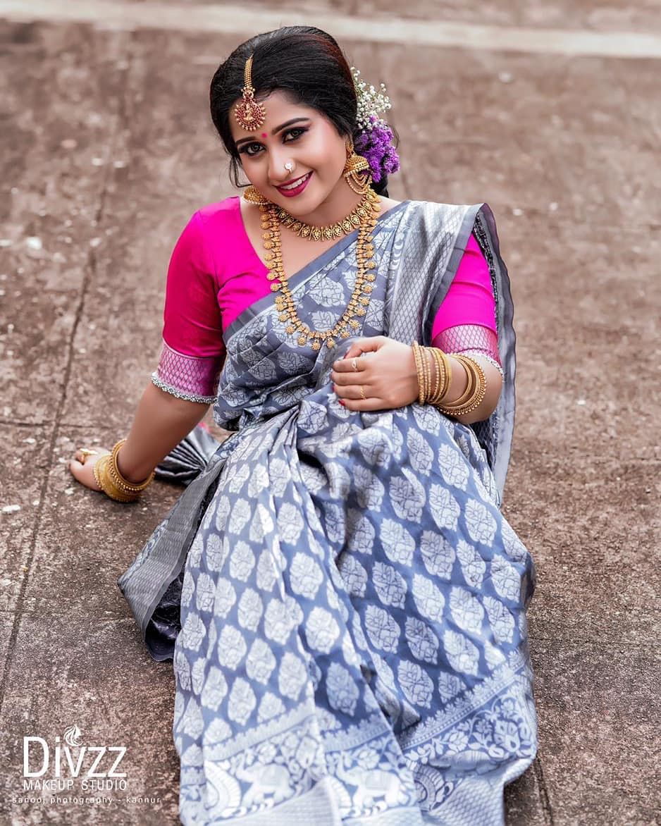 Beautifully Crafted Lichi Silk Saree with Zari Border