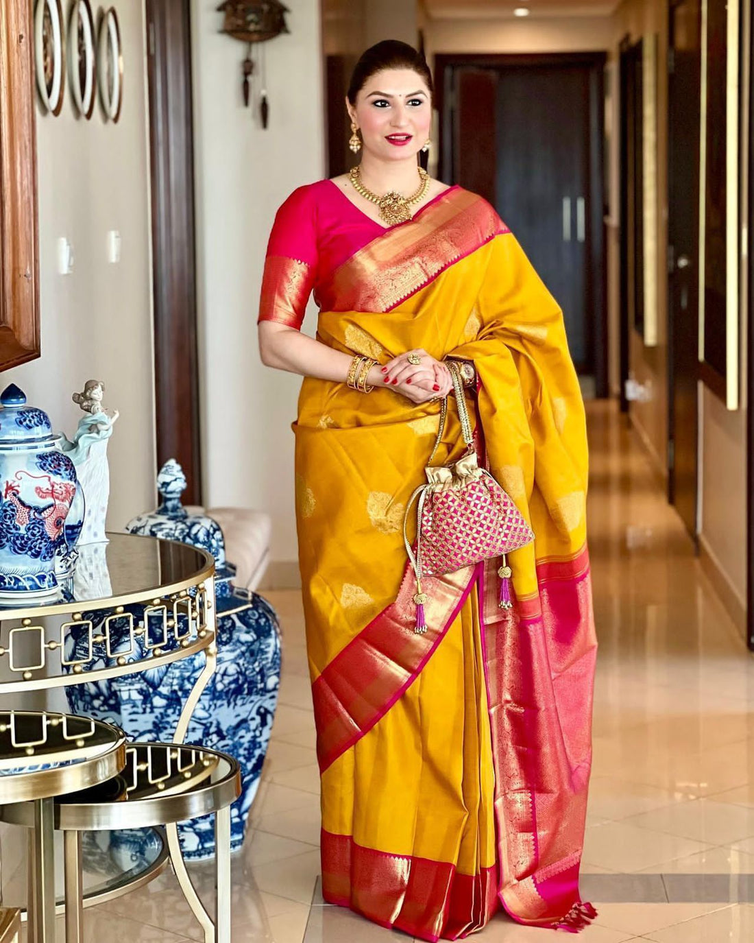 Stunning Yellow Lichi Silk Saree with Golden Zari Work