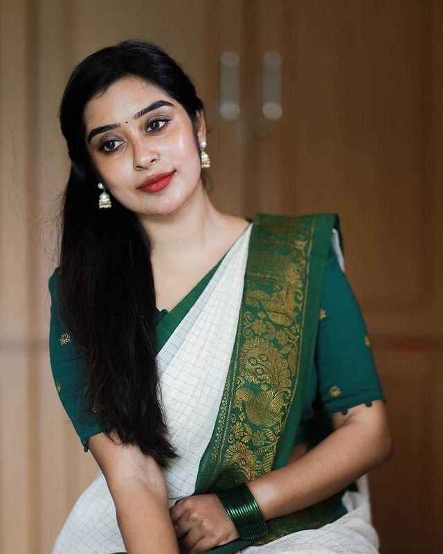 Handcrafted Lichi Silk Saree with Golden Zari Work