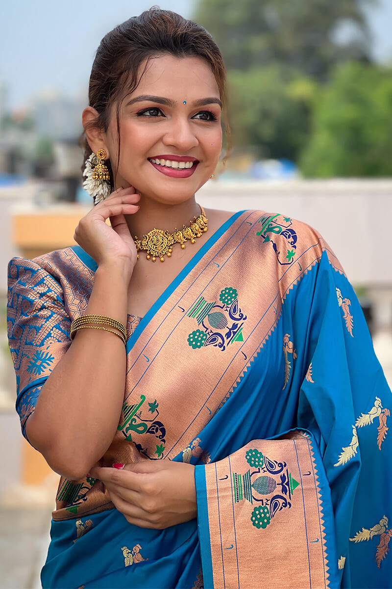 Elaborate Firozi Paithani Silk Saree With Whimsical Blouse Piece