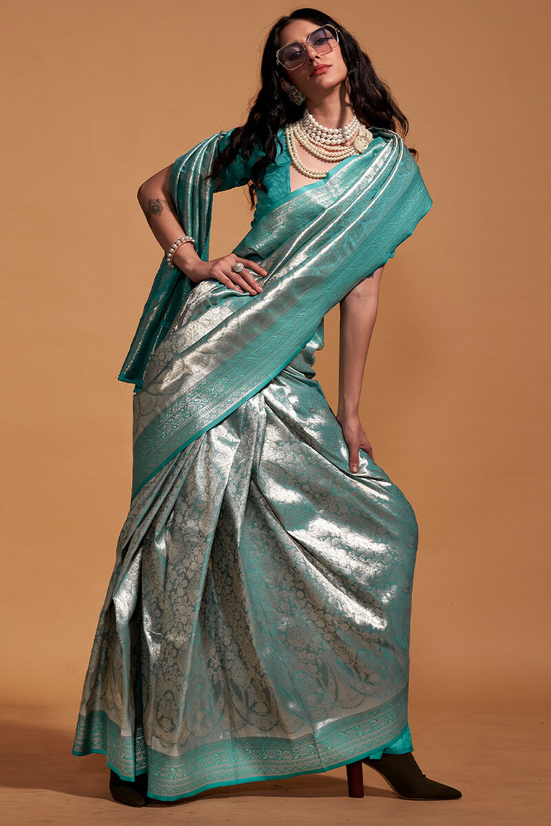 Demure Sea Green Kanjivaram Silk Saree With Ornate Blouse Piece