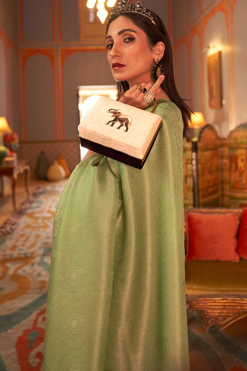 Staring Green Kanjivaram Silk Saree With Dazzling Blouse Piece