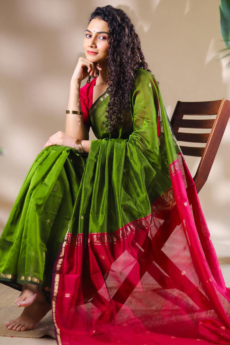 Opulent Green Cotton Silk Saree With Demanding Blouse Piece