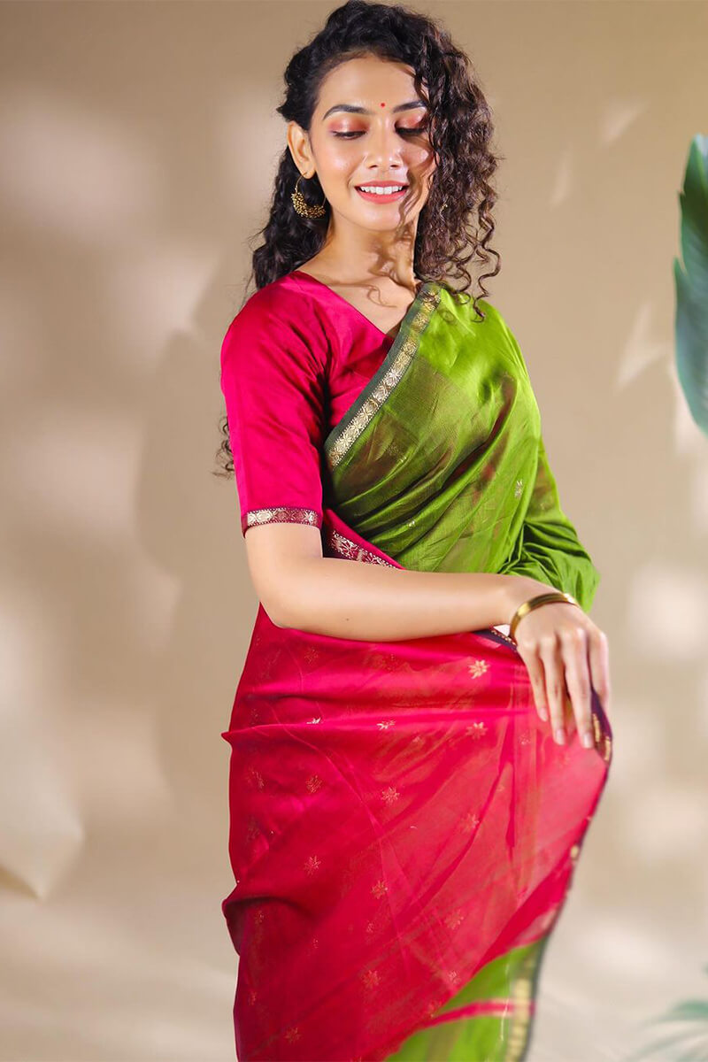 Opulent Green Cotton Silk Saree With Demanding Blouse Piece