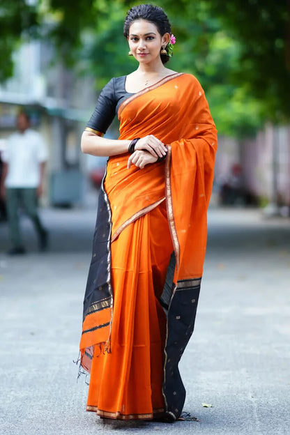 Enigmatic Orange Cotton Silk Saree With Panache Blouse Piece