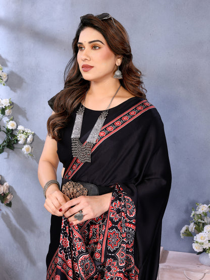 Supernal Black Ajrak Printed Soft Silk Saree With Piquant Blouse Piece