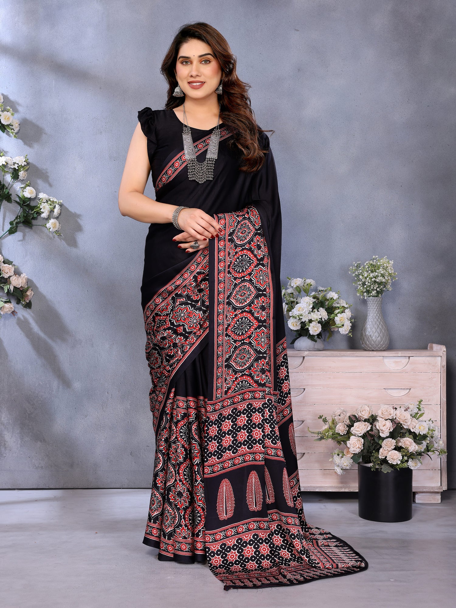 Supernal Black Ajrak Printed Soft Silk Saree With Piquant Blouse Piece