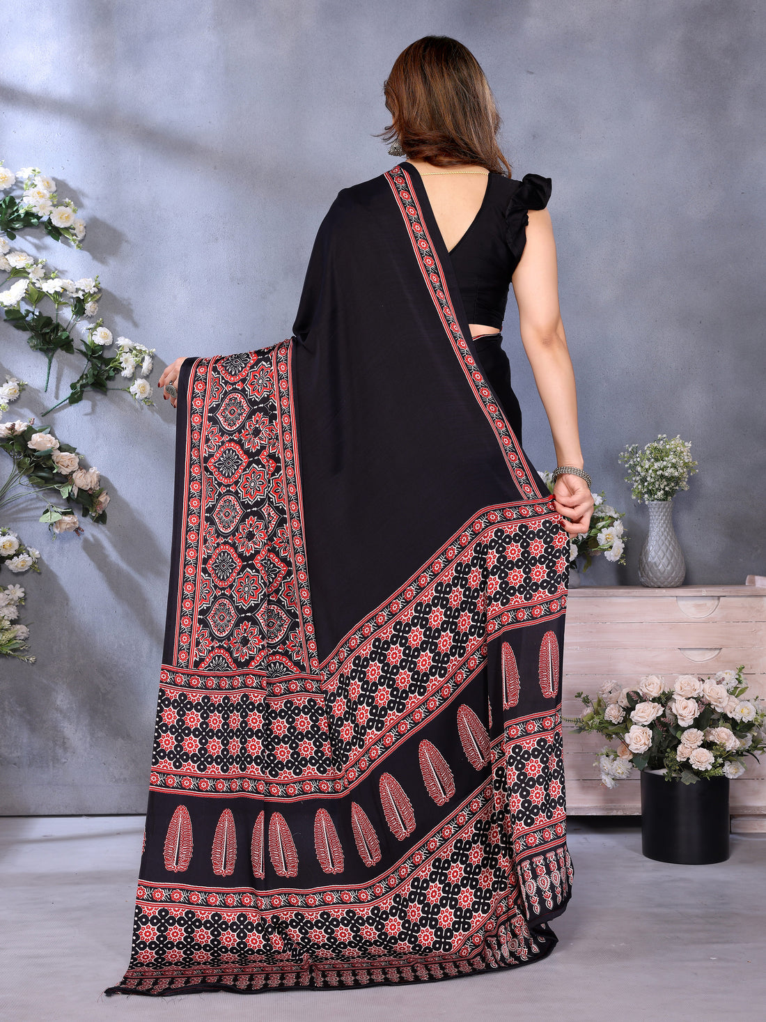 Supernal Black Ajrak Printed Soft Silk Saree With Piquant Blouse Piece