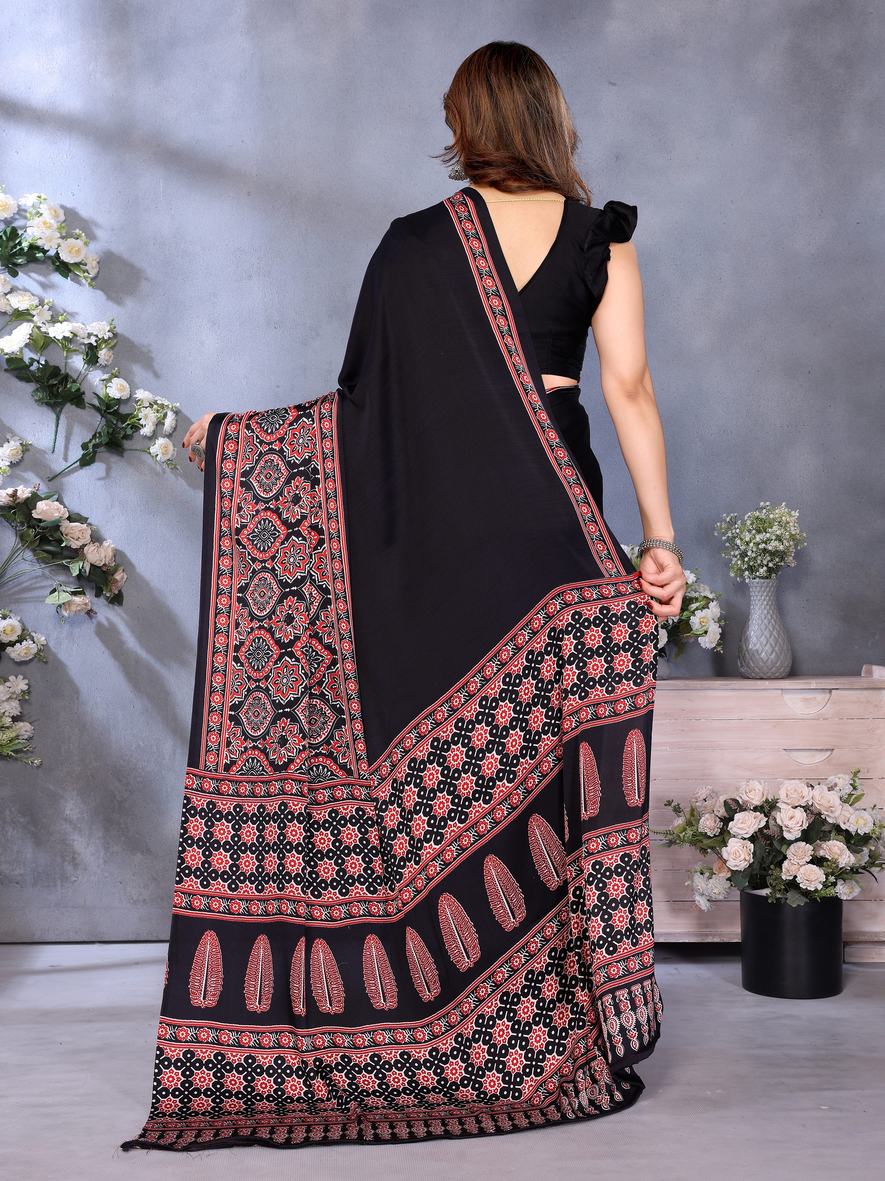 Supernal Black Ajrak Printed Soft Silk Saree With Piquant Blouse Piece