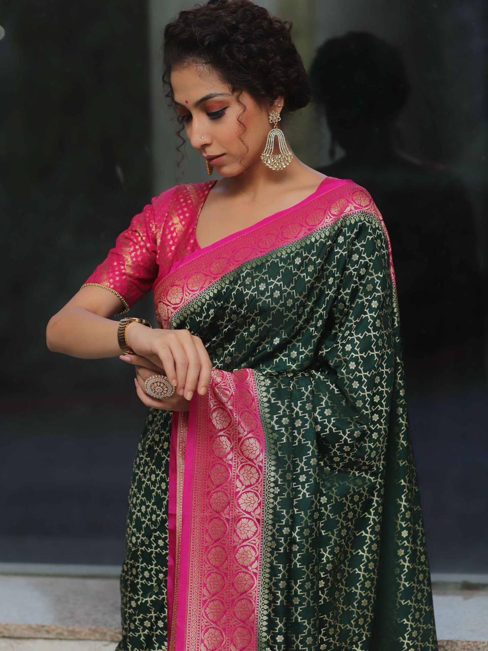 Surpassing Green Soft Silk Saree With Unique Pink Blouse Piece