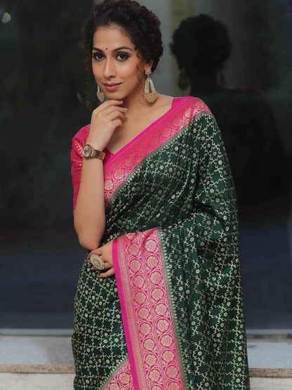 Surpassing Green Soft Silk Saree With Unique Pink Blouse Piece