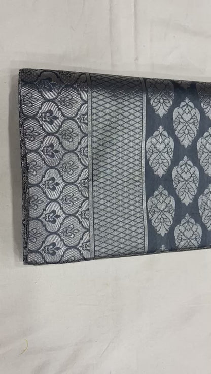 Beautifully Crafted Lichi Silk Saree with Zari Border